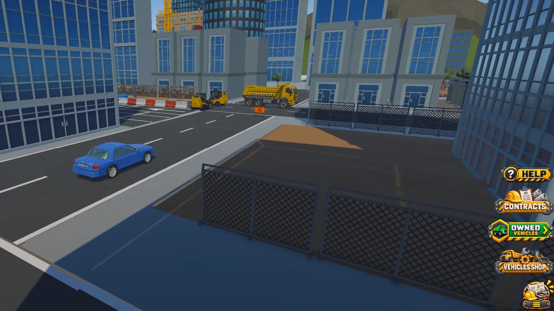In-game: a car drives past a fenced excavation pit